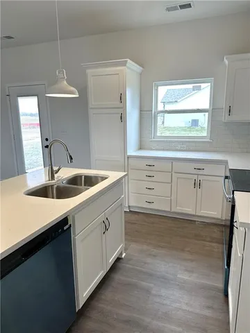 $287,500 | 1302 Northeast Redwood Court, Oak Grove, MO 64075