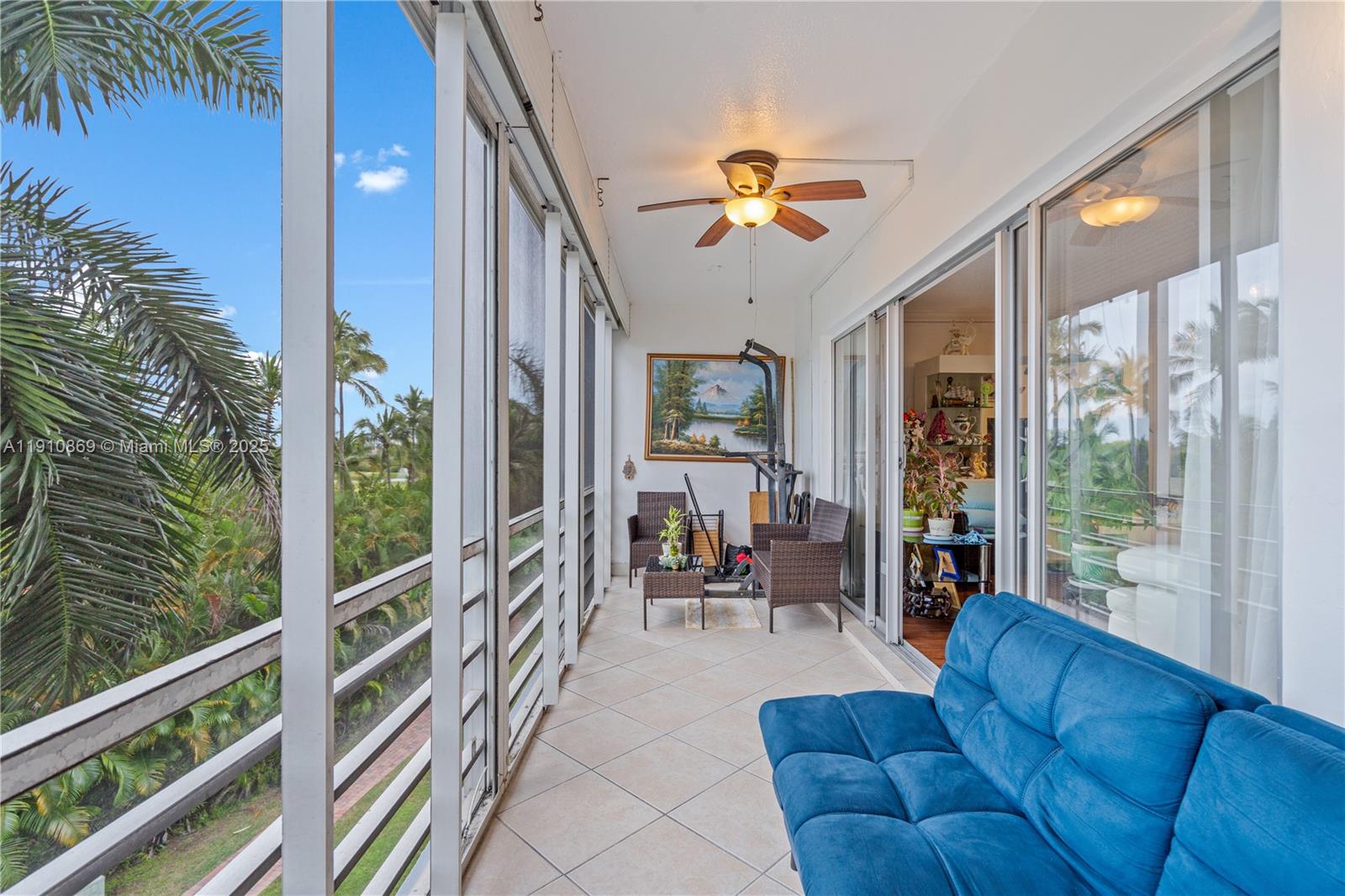 1425 Atlantic Shores Boulevard, Unit 409 Hallandale Beach, FL 33009 - Photo 28 of 30 a living room with furniture and a large window