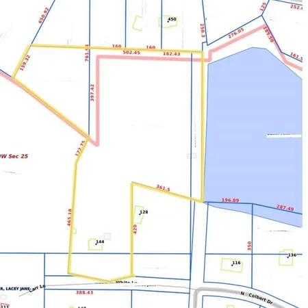 a view of a balcony with floor to ceiling windows