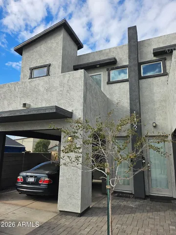 a view of parking house and car parked
