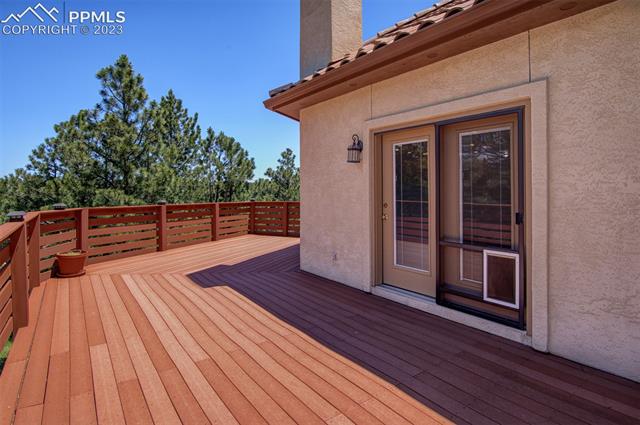 17010 Oxbridge Road Monument, CO 80132 - Photo 6 of 20 Attached Deck off of main level
