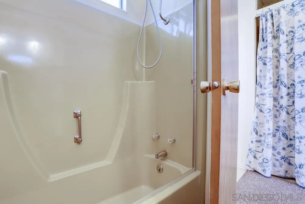 650 South Rancho Santa Fe Road, Unit 44 San Marcos, CA 92078 - Photo 22 of 25 a bathroom with a shower