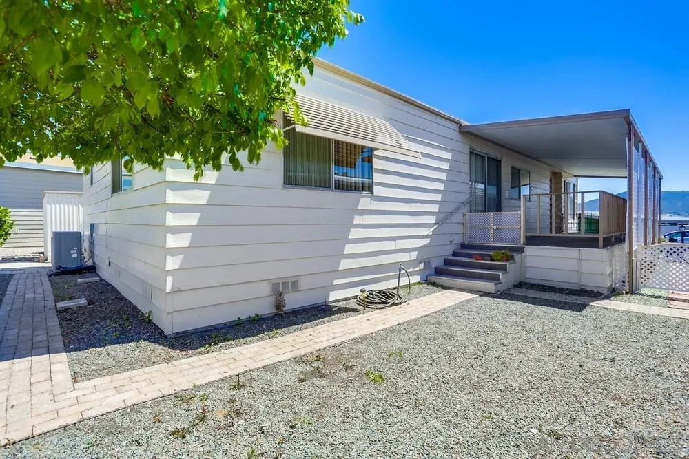 650 South Rancho Santa Fe Road, Unit 44 San Marcos, CA 92078 - Photo 25 of 25 a view of a house with a yard