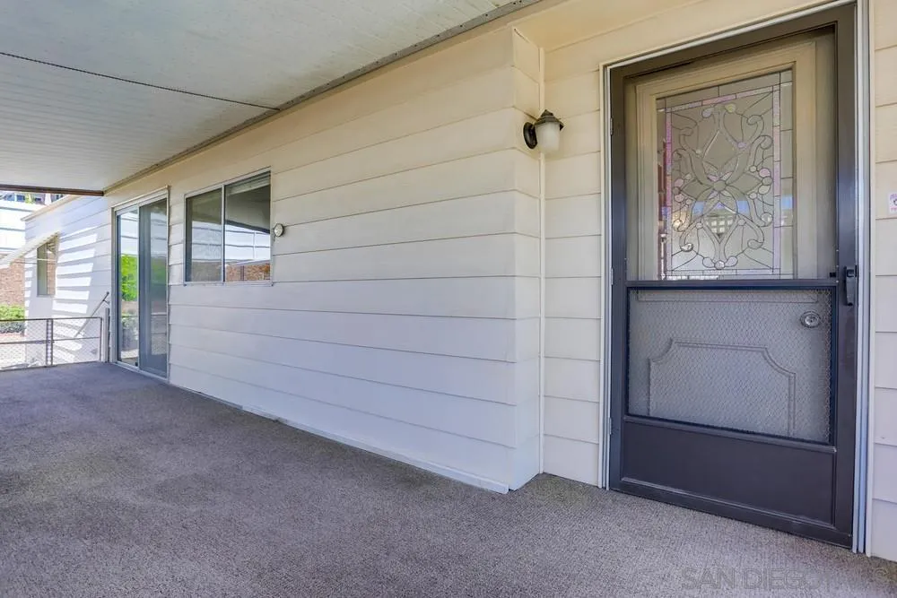 650 South Rancho Santa Fe Road, Unit 44 San Marcos, CA 92078 - Photo 4 of 25 a room with a bench