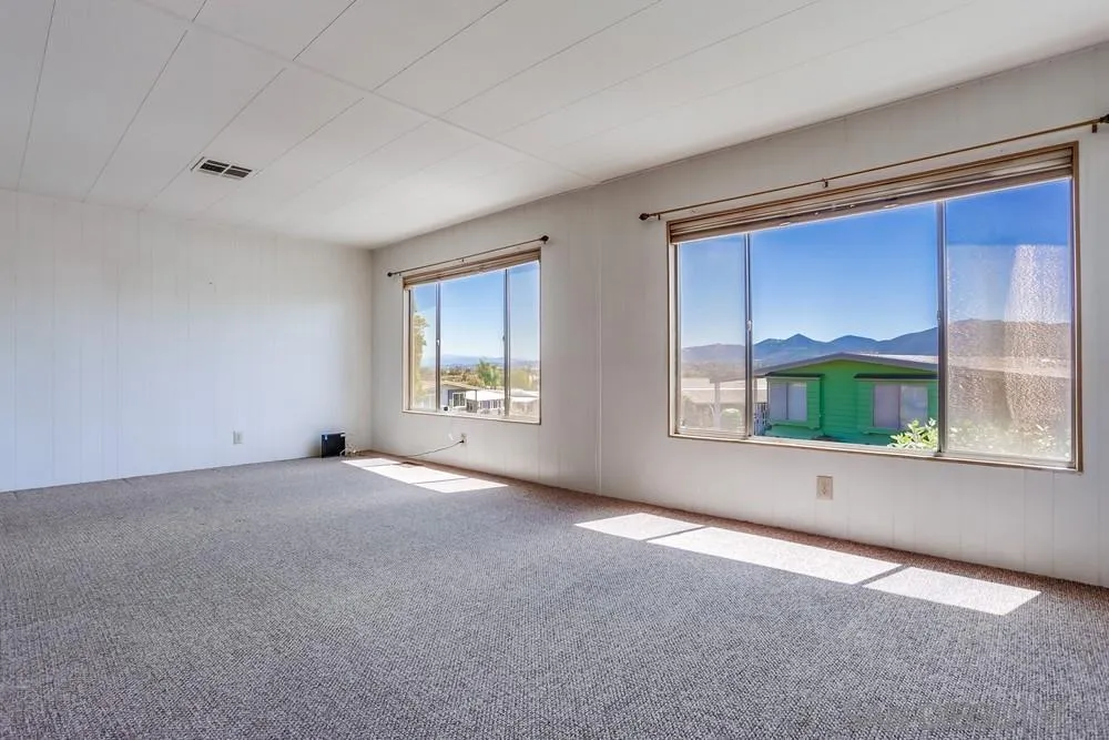 650 South Rancho Santa Fe Road, Unit 44 San Marcos, CA 92078 - Photo 7 of 25 a view of an empty room with a window