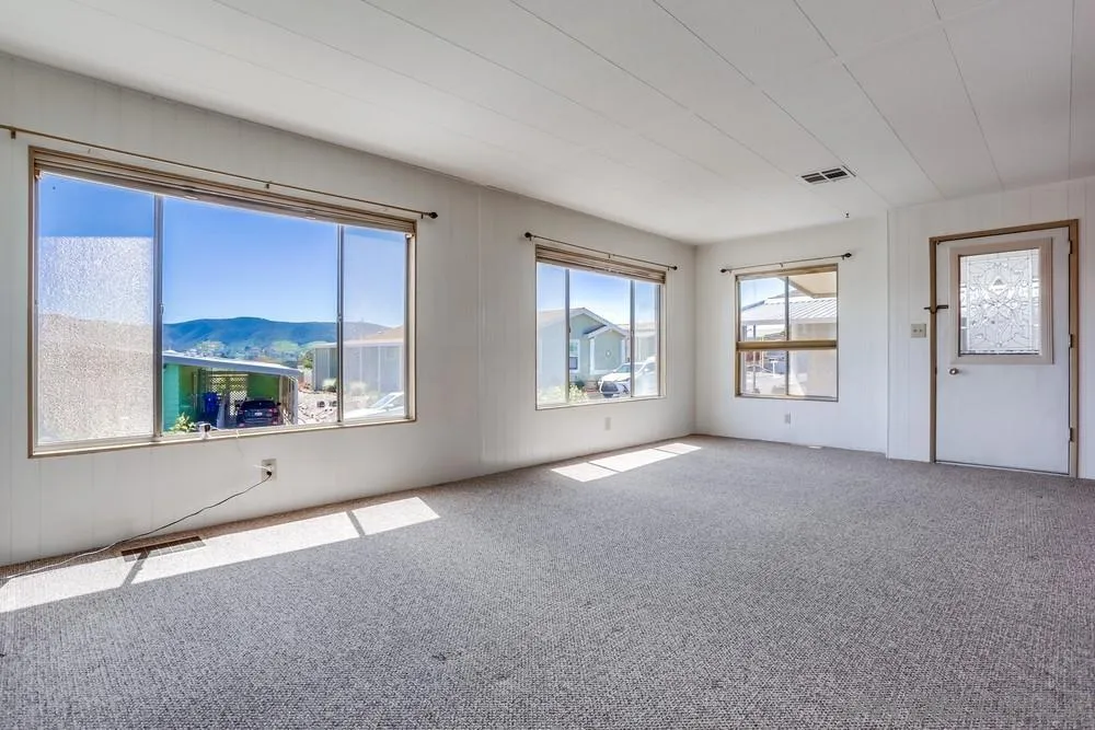 650 South Rancho Santa Fe Road, Unit 44 San Marcos, CA 92078 - Photo 8 of 25 a view of an empty room with a window