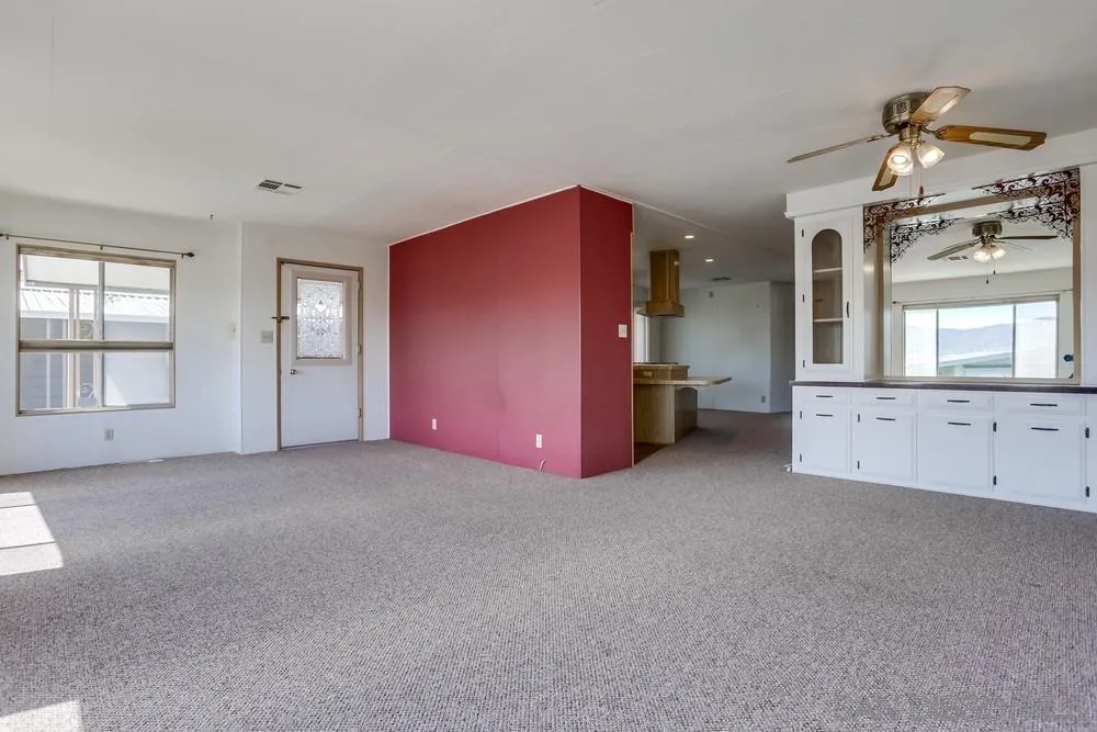650 South Rancho Santa Fe Road, Unit 44 San Marcos, CA 92078 - Photo 9 of 25 a big room with closet and windows