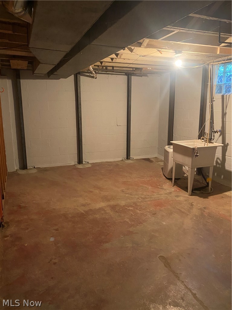 1256 Garman Road Akron, OH 44313 - Photo 25 of 32 Basement with sink