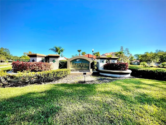 a view of a house with a yard porch and sitting area