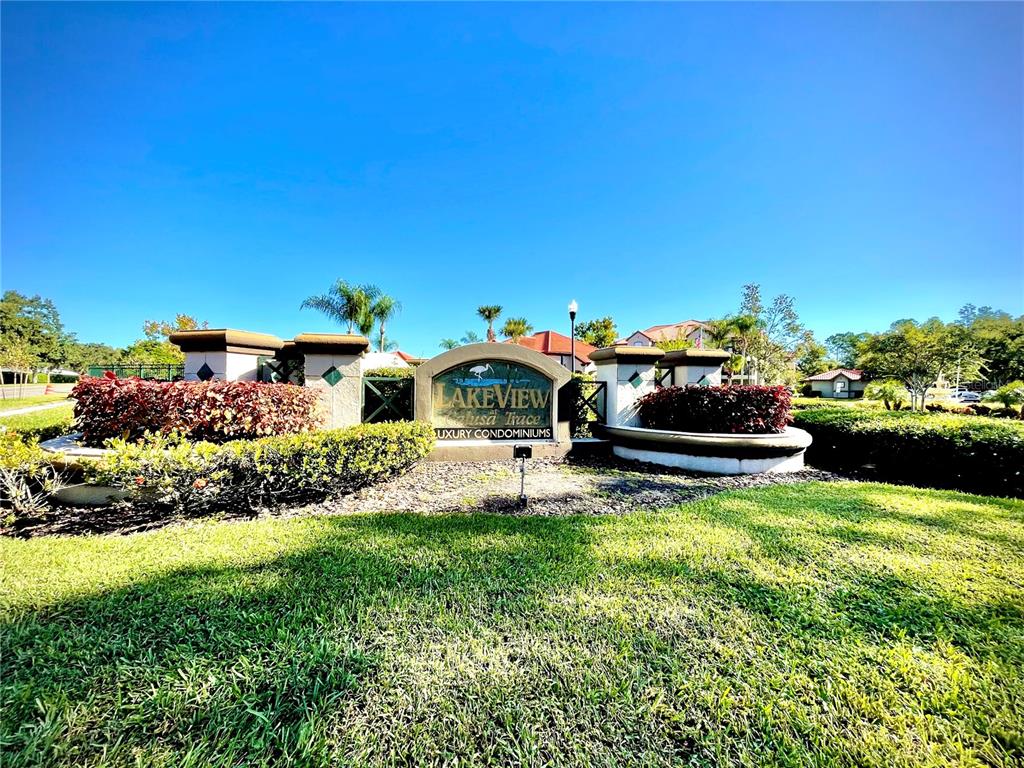 a view of a house with a yard porch and sitting area