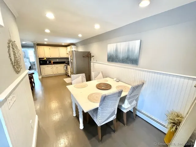 a dining room with furniture and a table