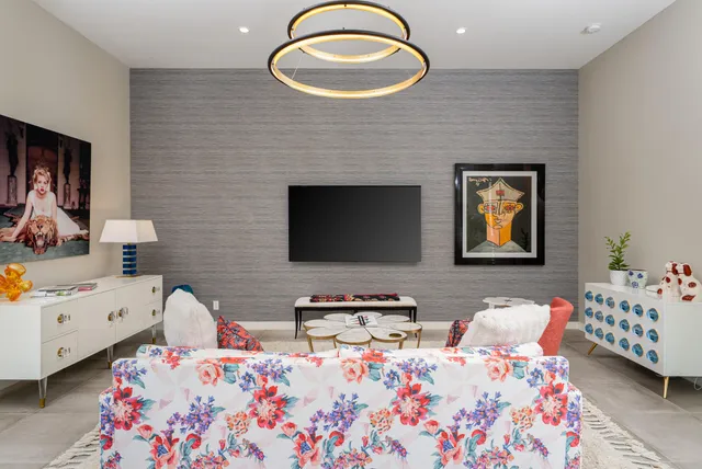 a living room with furniture and a table