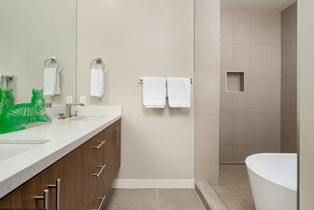 a white bath tub sitting in a bathroom
