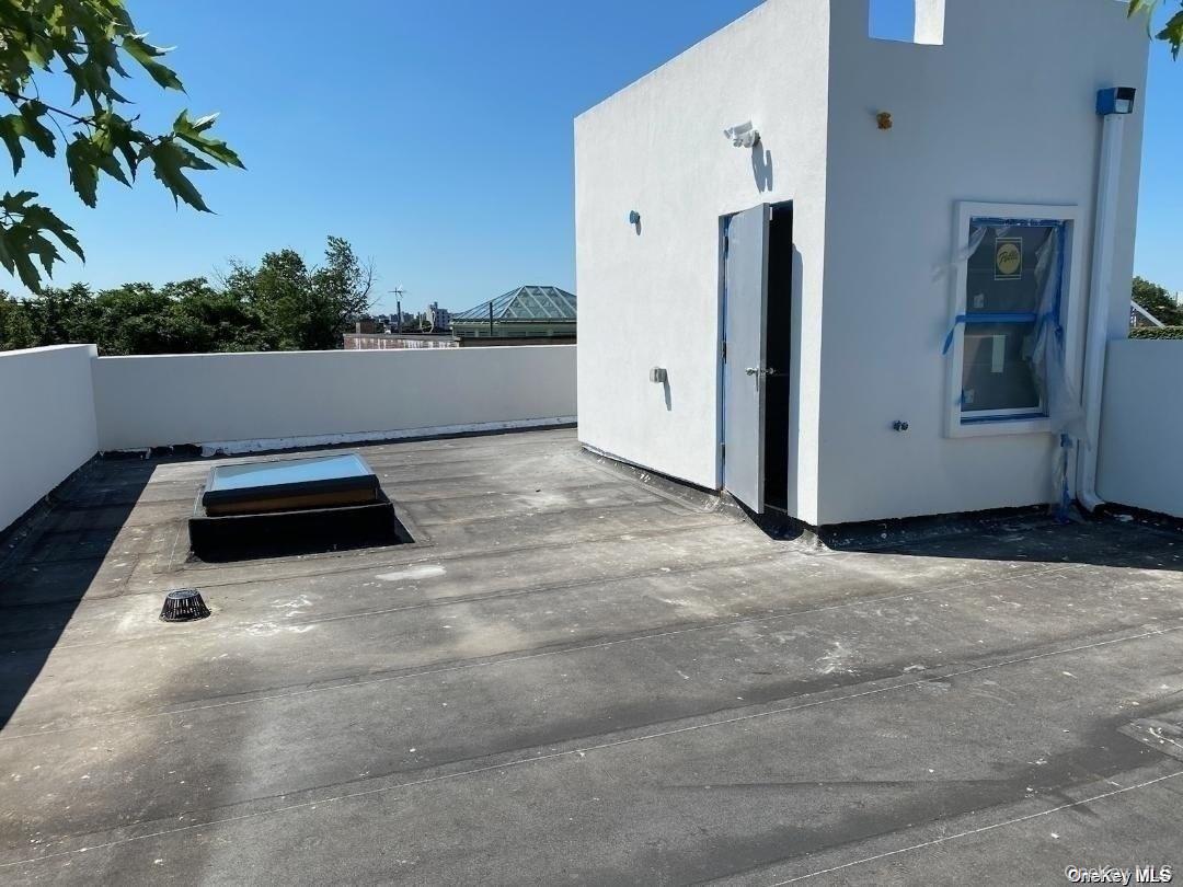 3043 Fulton Street Brooklyn, NY 11208 - Photo 11 of 14 a view of appliances and yard in the background