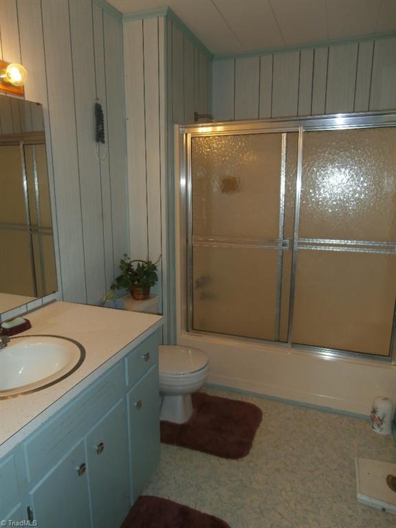 486 Jerry Frye Road Bennett, NC 27208 - Photo 6 of 16 Full Bathroom. Paneled. Vinyl Flooring. Spacious Vanity.