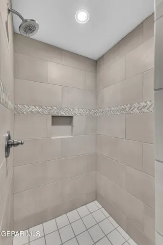 a bathroom with a bathtub and a sink