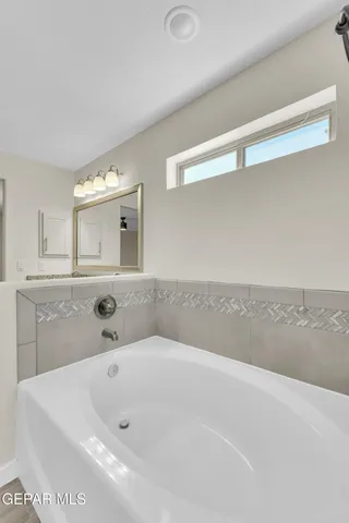 a view of a hallway view with staircase