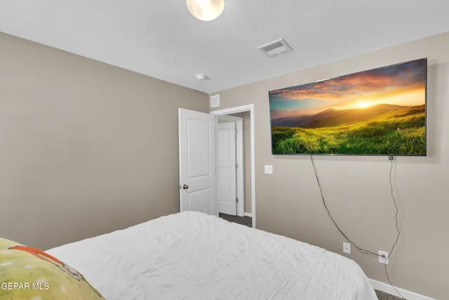 a view of room with racks on the wall