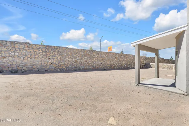a view of gym equipment and outdoor seating