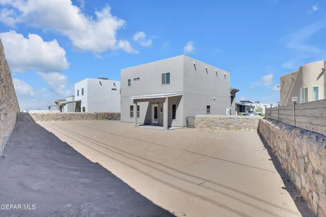 an aerial view of a large building with garden