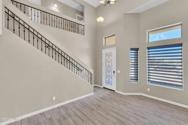 a view of staircase with wooden floor and stairs
