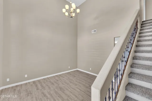 a view of a hallway with staircase