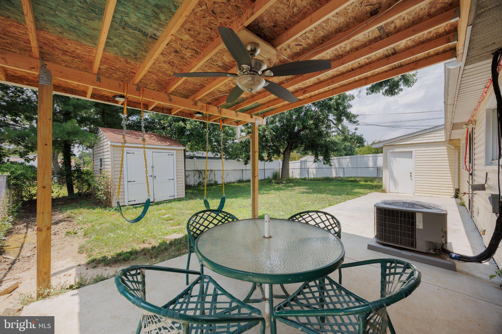 2106 North Rolling Road Windsor Mill, MD 21244 - Photo 20 of 24 Charming patio for outdoor relaxation.