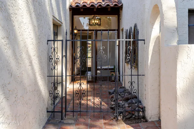 a picture of door with a white wall