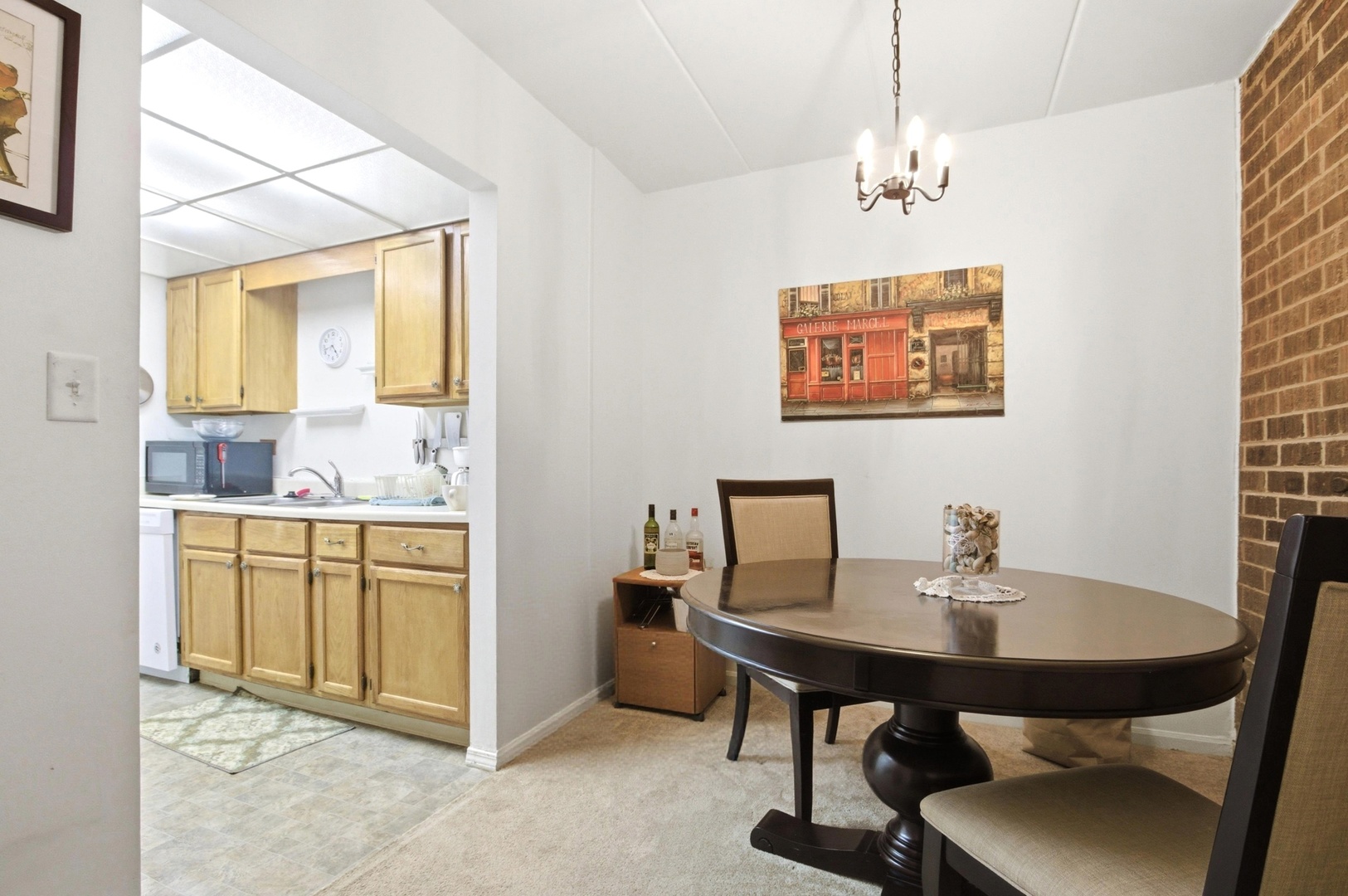 154 East Bailey Road, Unit D Naperville, IL 60565 - Photo 10 of 20 a view of a dining room with furniture