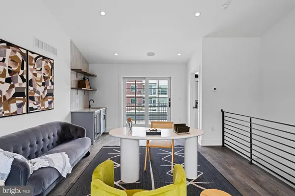 a workspace with furniture and window