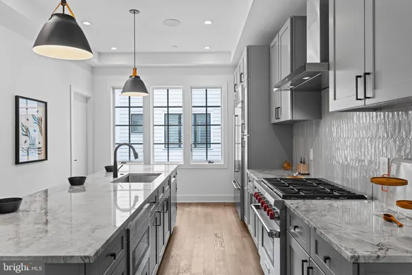 a work room with furniture and wooden floor