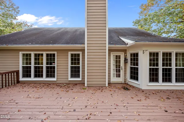 a view of a backyard of the house