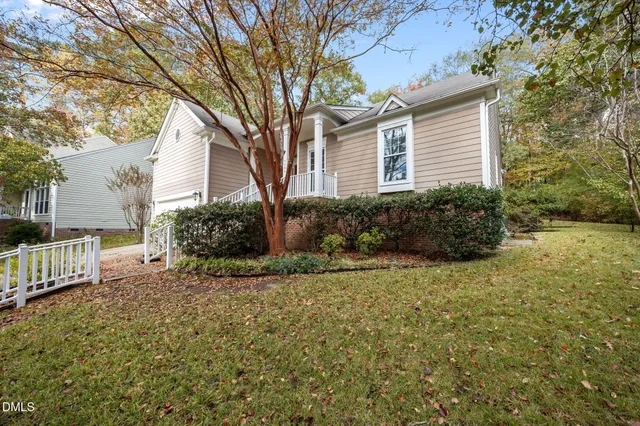 a view of living room and hardwood floor