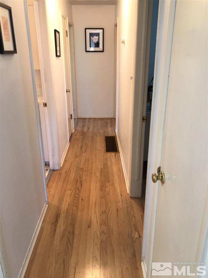 1205 Wilkinson Avenue Reno, NV 89502 - Photo 7 of 17 view of a hallway with wooden floor