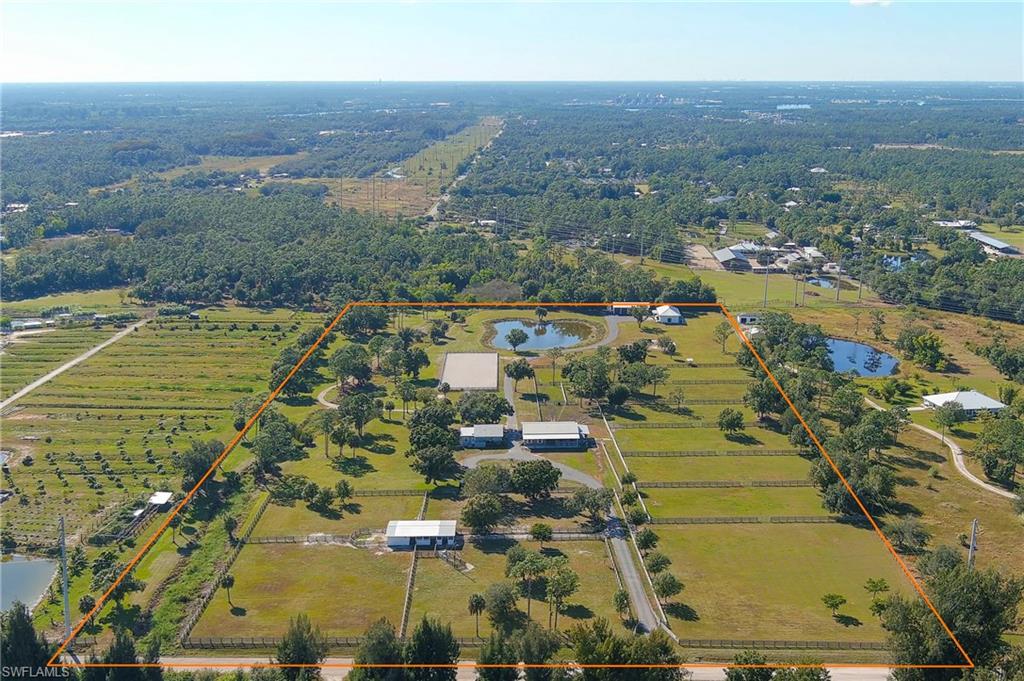 10910 Ruden Road North Fort Myers, FL 33917 - Photo 1 of 48 an aerial view of residential houses with outdoor space