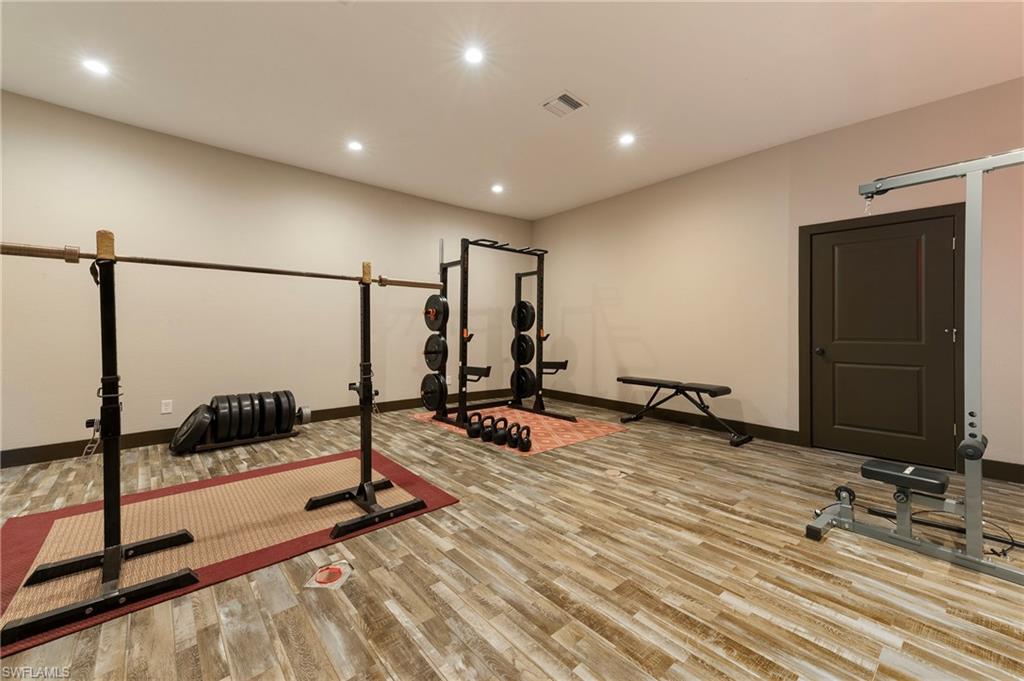 10910 Ruden Road North Fort Myers, FL 33917 - Photo 11 of 48 a view of a room with gym equipment