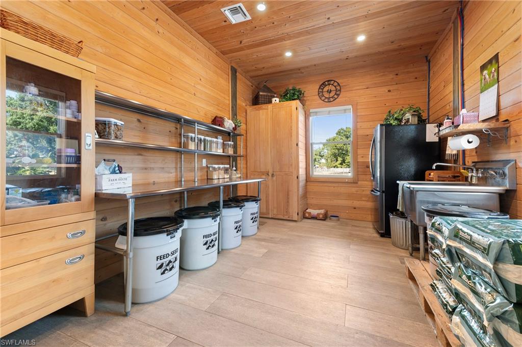 10910 Ruden Road North Fort Myers, FL 33917 - Photo 36 of 48 a view of a storage & utility room