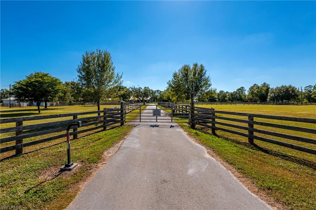 10910 Ruden Road North Fort Myers, FL 33917 - Photo 47 of 48 a view of park with wooden fence