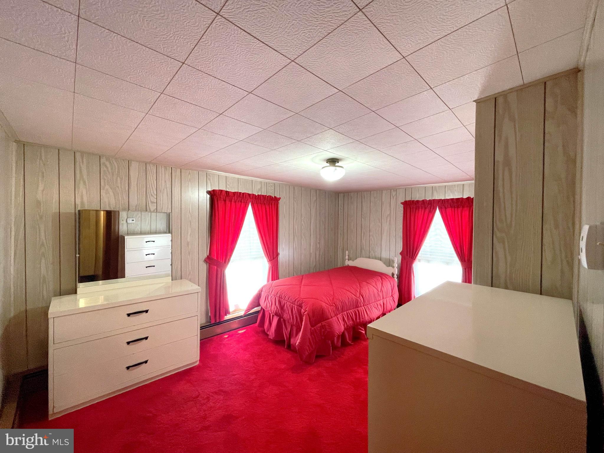 6700 Hungerford Road Bryans Road, MD 20616 - Photo 20 of 36 a bedroom with a bed and a dresser