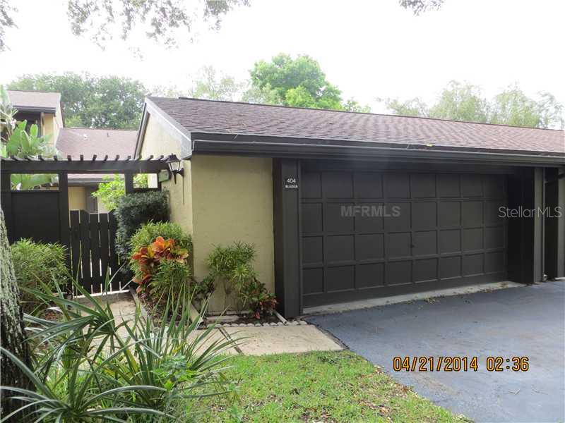 13300 Indian Rocks Road, Unit 404 Largo, FL 33774 - Photo 1 of 1 Exterior Front - This villa has a courtyard entrance with 1729 sq. ft. The living room has a fireplace with sliding doors going out into your private deck.