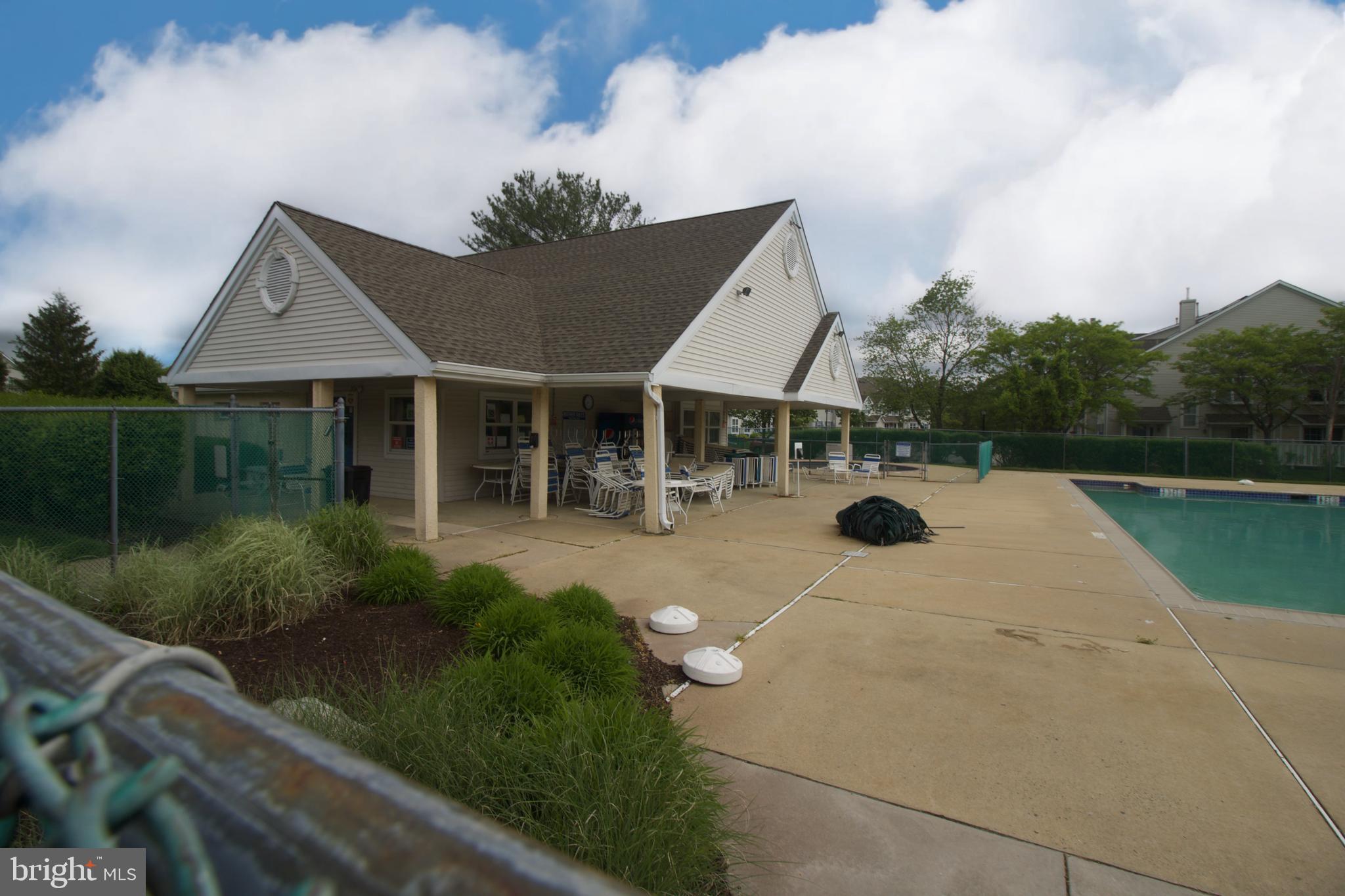 705 Oliphant Lane Mount Laurel, NJ 08054 - Photo 11 of 28 a view of a house with backyard sitting area and lake view