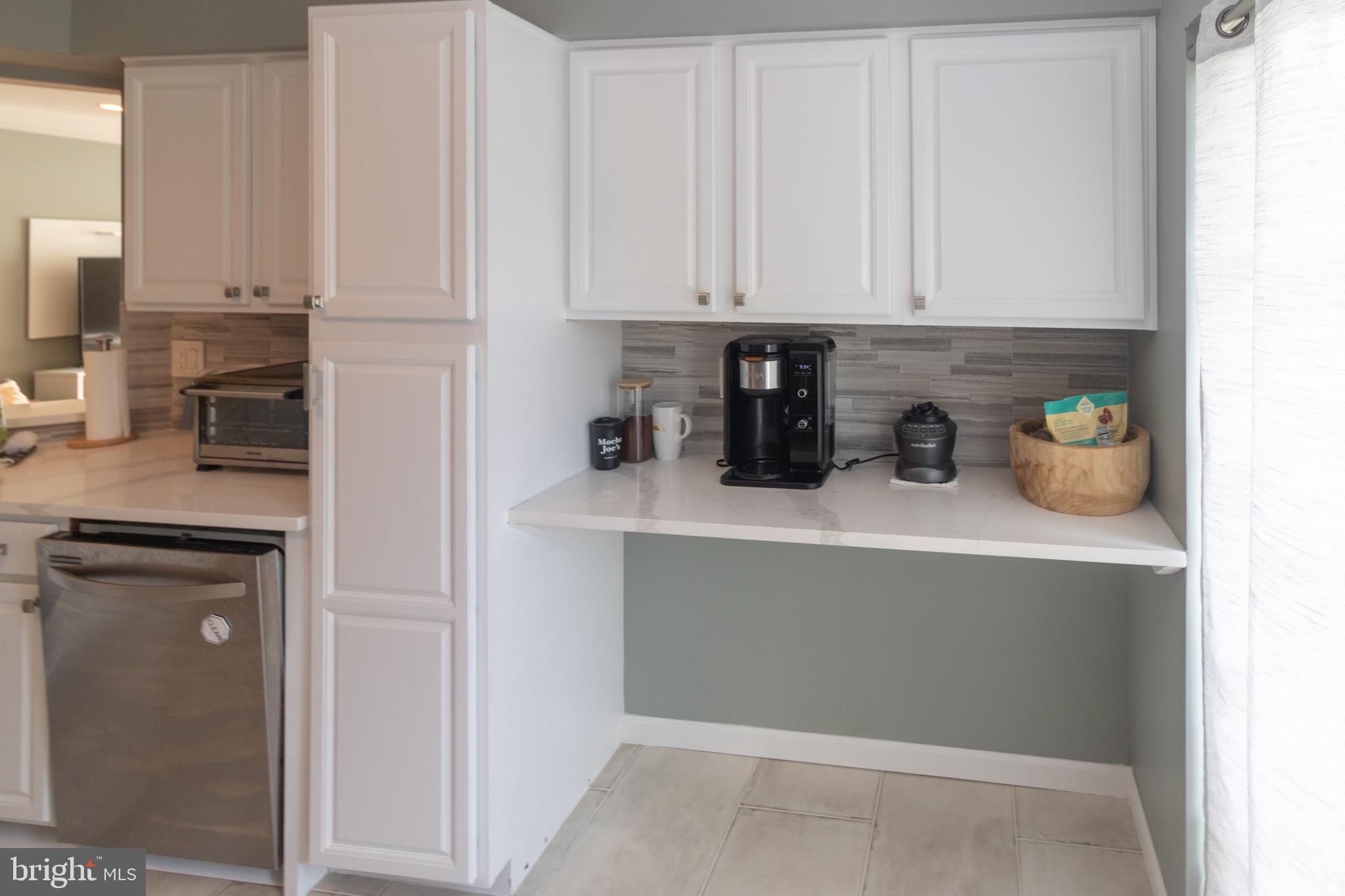 705 Oliphant Lane Mount Laurel, NJ 08054 - Photo 13 of 28 a kitchen with white cabinets and appliances
