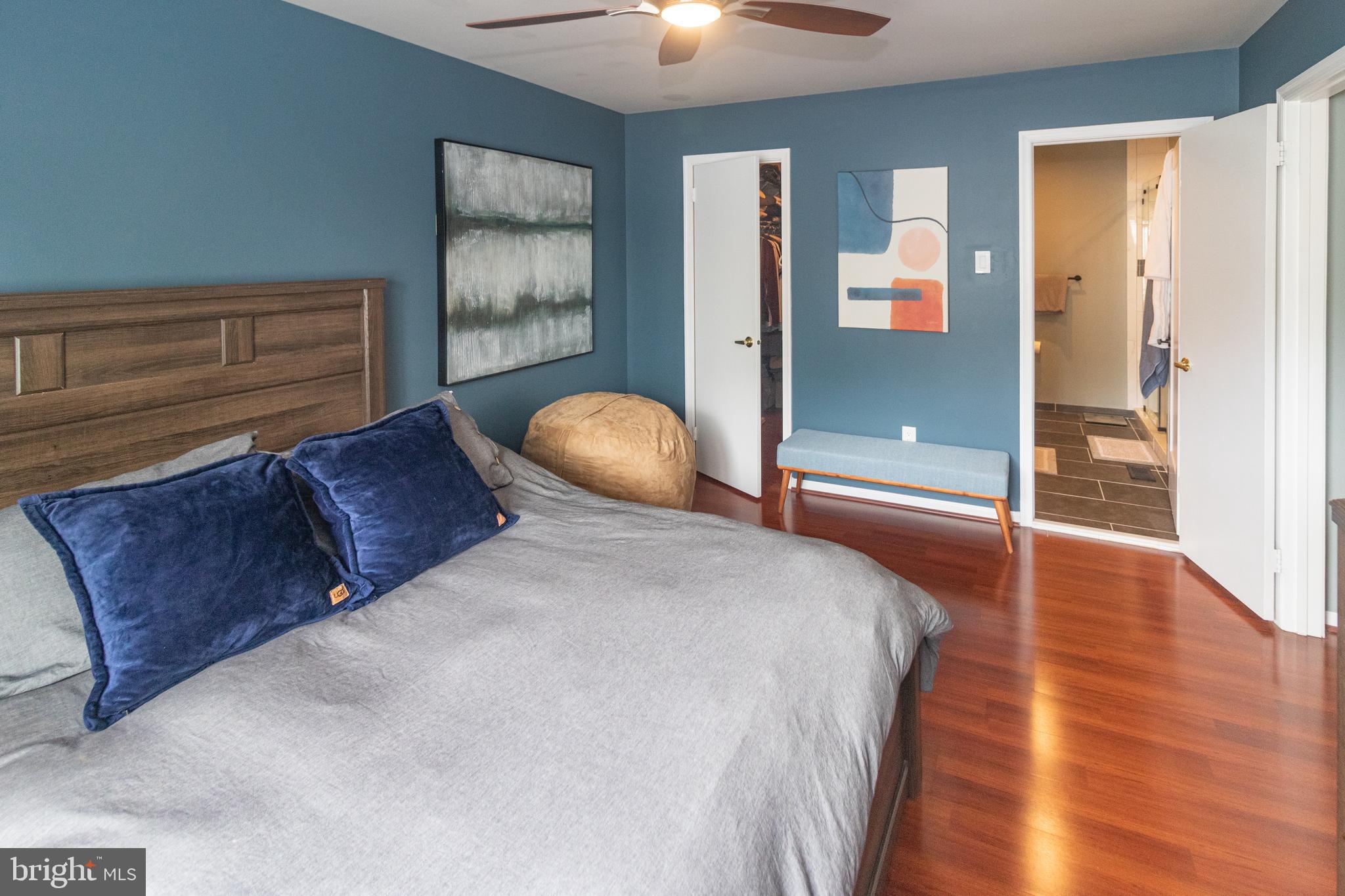 705 Oliphant Lane Mount Laurel, NJ 08054 - Photo 16 of 28 a bedroom with a bed and wooden floor