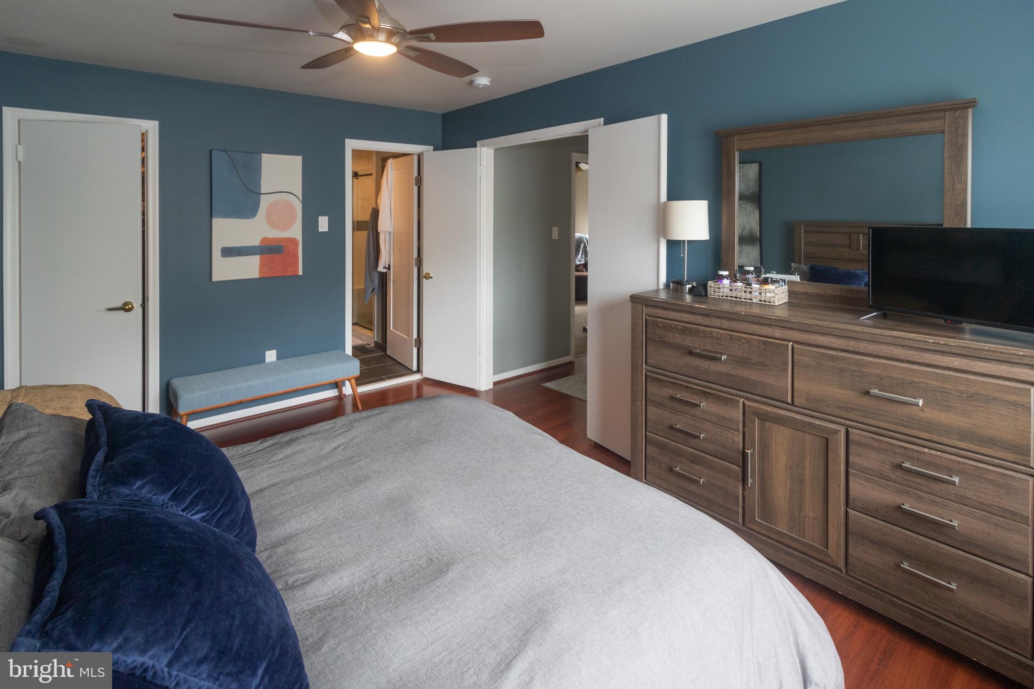 705 Oliphant Lane Mount Laurel, NJ 08054 - Photo 17 of 28 a bedroom with a large bed and a dresser