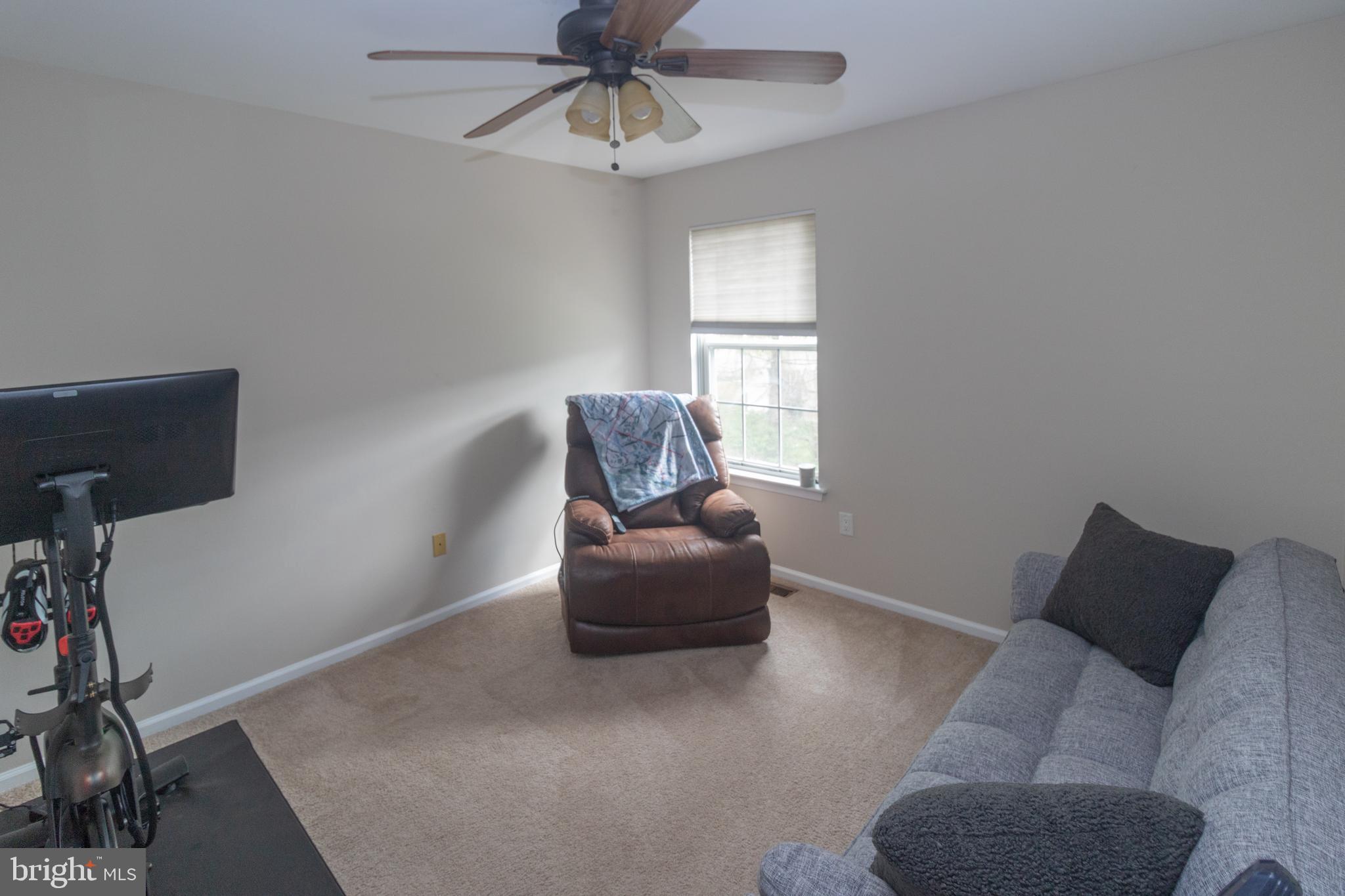 705 Oliphant Lane Mount Laurel, NJ 08054 - Photo 21 of 28 a living room with furniture and a window