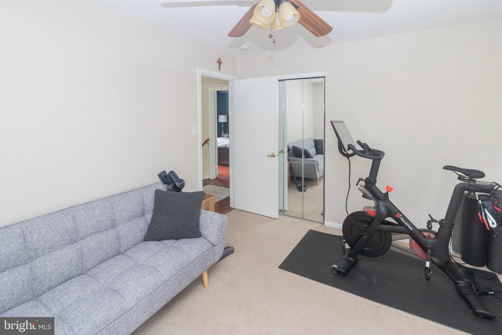 705 Oliphant Lane Mount Laurel, NJ 08054 - Photo 22 of 28 a living room with furniture a flat screen tv and a wooden floor