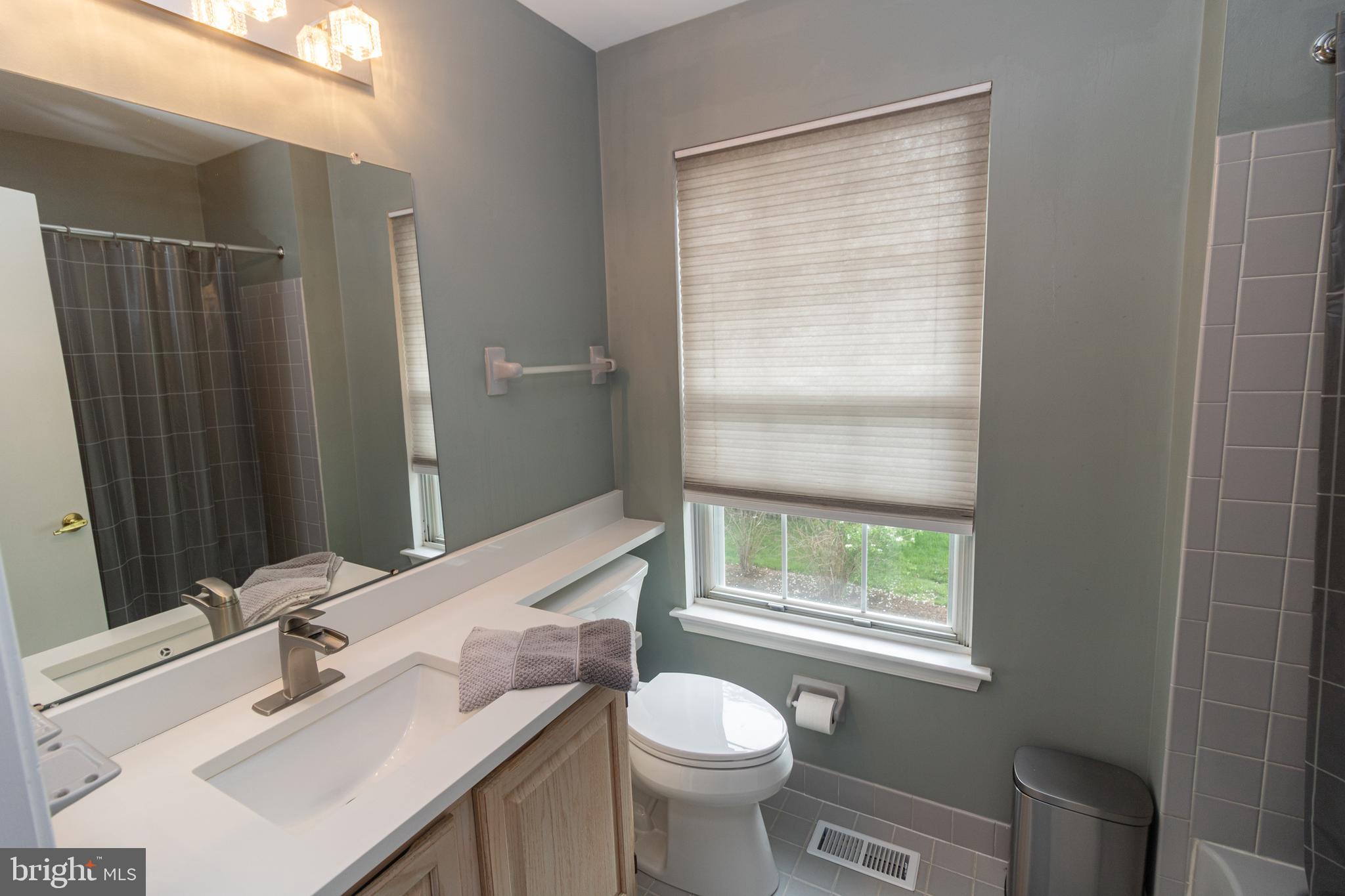 705 Oliphant Lane Mount Laurel, NJ 08054 - Photo 24 of 28 a bathroom with a sink toilet and shower