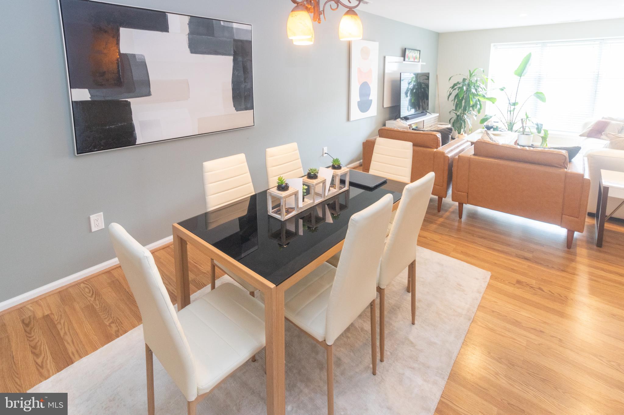 705 Oliphant Lane Mount Laurel, NJ 08054 - Photo 6 of 28 a view of a dining room with furniture and wooden floor