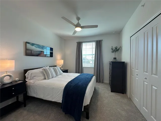a bathroom with a sink double vanity granite tub and shower