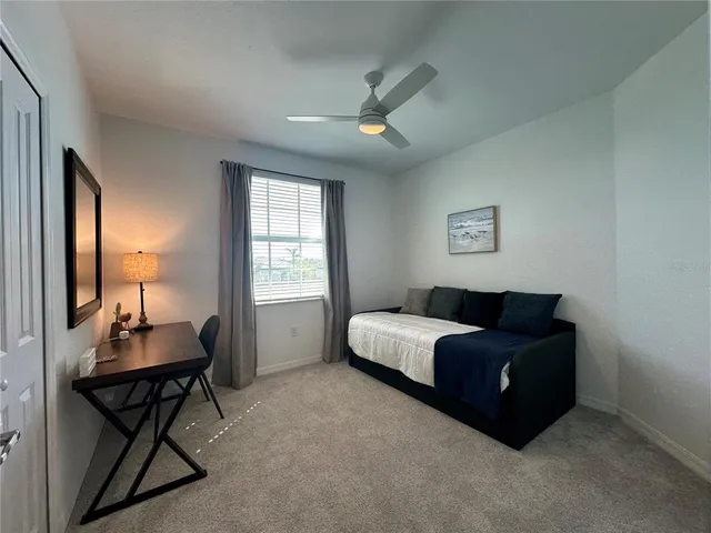 a view of a closet with storage